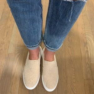 Cream colored teddy bear slides